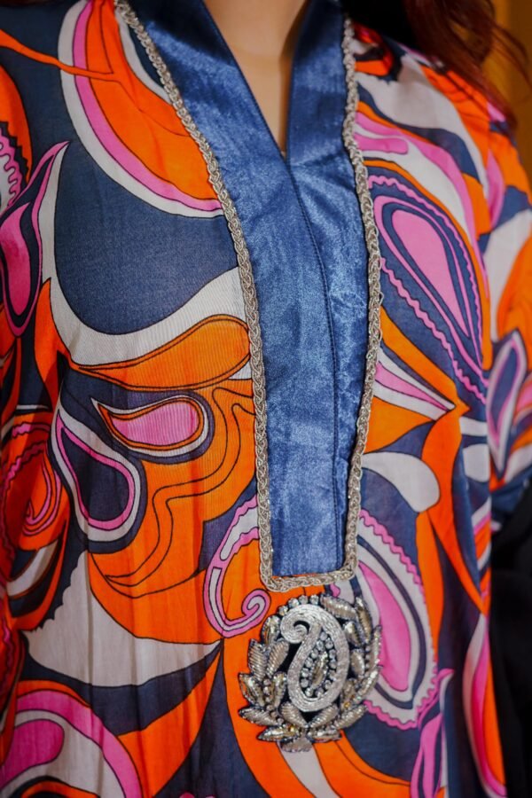 Bold Abstract Printed Ethnic Outfit in Orange and Purple Tones