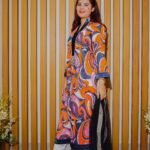 Bold Abstract Printed Ethnic Outfit in Orange and Purple Tones