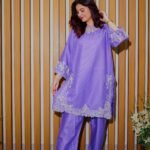Stay cool and stylish this season with this soft lavender 2-piece suit, featuring delicate white embroidery. A graceful pick for daytime events or everyday wear.