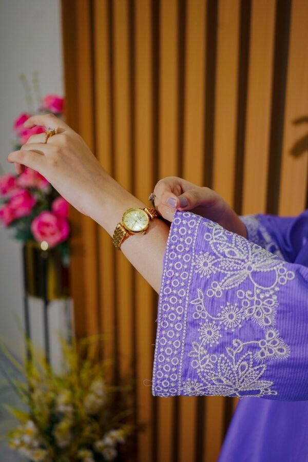Stay cool and stylish this season with this soft lavender 2-piece suit, featuring delicate white embroidery. A graceful pick for daytime events or everyday wear.