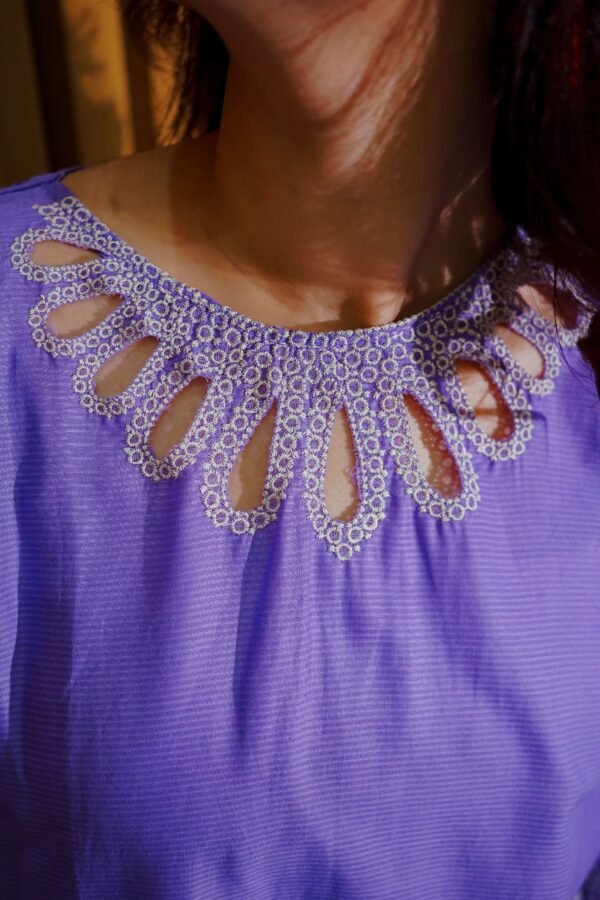 Stay cool and stylish this season with this soft lavender 2-piece suit, featuring delicate white embroidery. A graceful pick for daytime events or everyday wear.