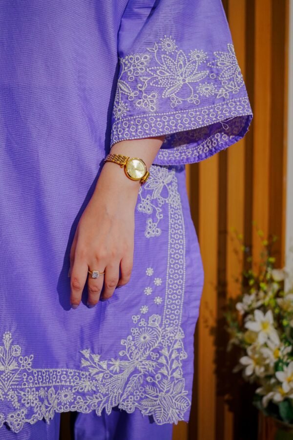 Stay cool and stylish this season with this soft lavender 2-piece suit, featuring delicate white embroidery. A graceful pick for daytime events or everyday wear.