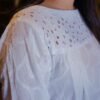 Sunlit Grace – White Embroideries with Citrus Bloom