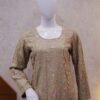 Noura – Grace in Gold