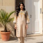 Elegant Peach Silk Ensemble with Royal Baroque Detailing